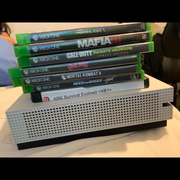 Console is in perfect condition comes with wires, video games and a controller. - Picture 6 of 7